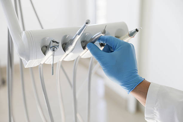 Professional Emergency Dentist technician working in Fulton, NY